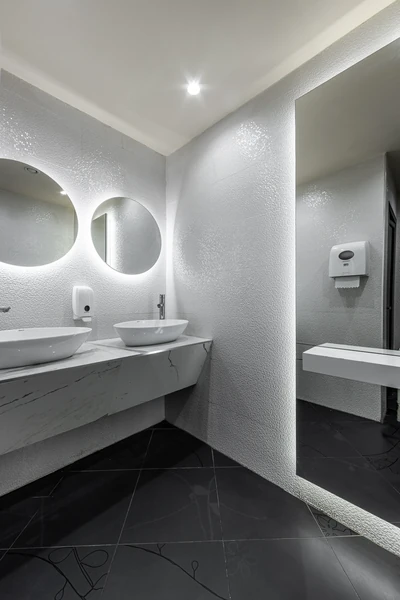 Washbasin area in the restroom at Easy Restaurant